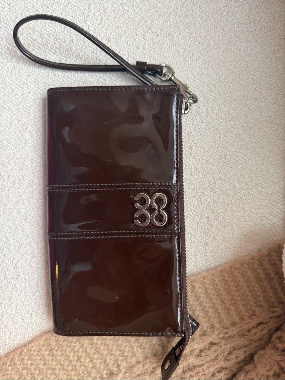Coach Patent Leather Wristlet in Dark Brown Burgundy with Silver Logo